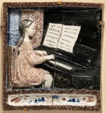 Рельеф «Галя за пианино»
